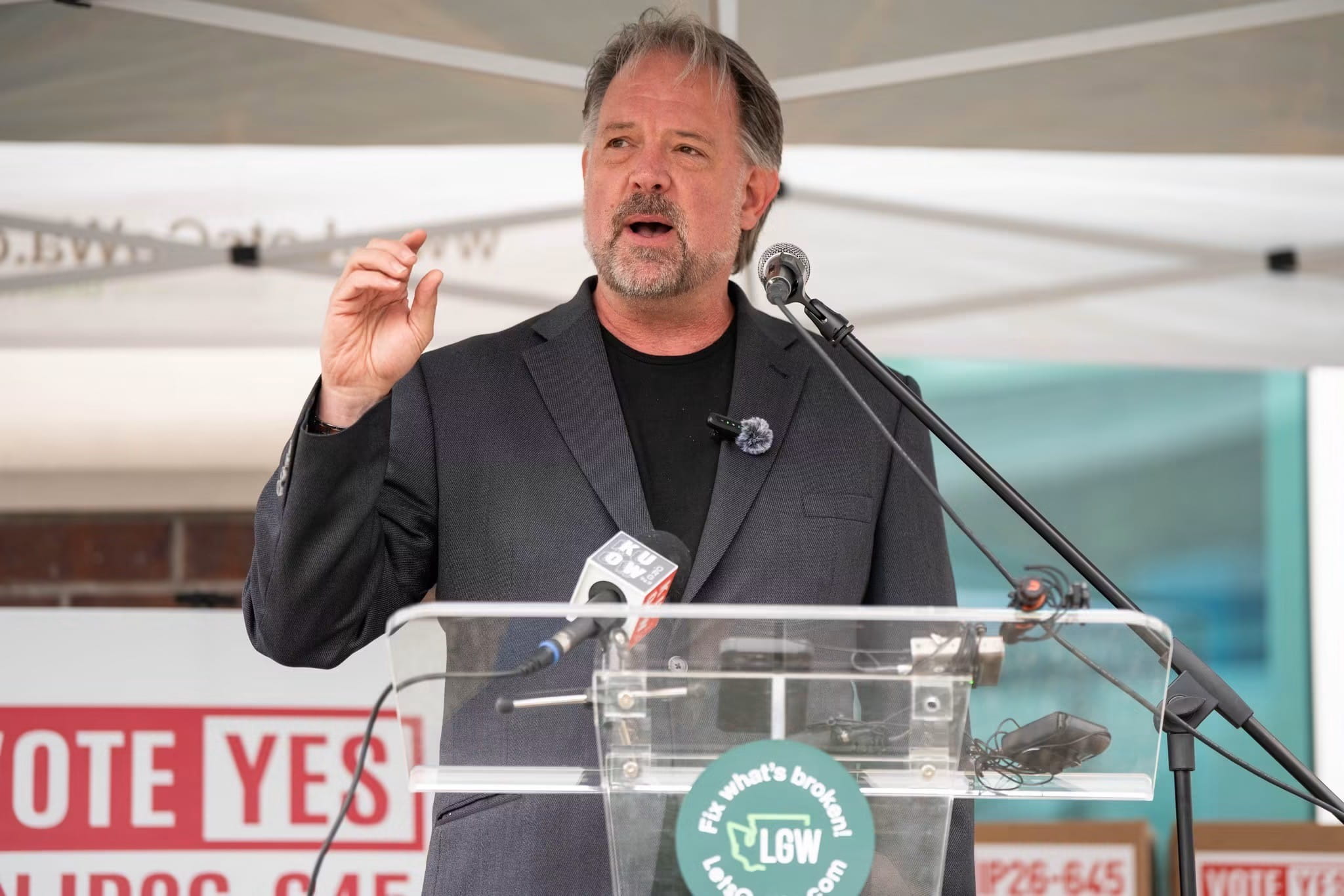 Picture of Brian Heywood speaking at the Secretary of State's office